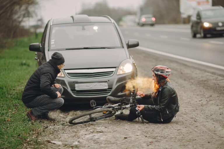 Picture of person hit by a car who may have pain and suffering