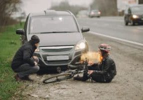 Picture of person hit by a car who may have pain and suffering